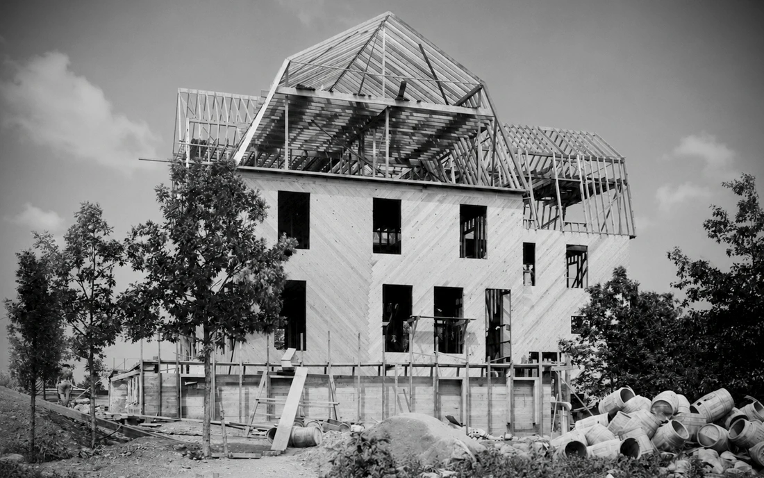 Idylease under construction in 1902, showing the timber roof framing and unfinished exterior walls
