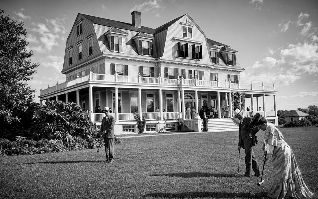 Dr. Edgar Day and his wife playing croquet on the Great Lawn at Idylease