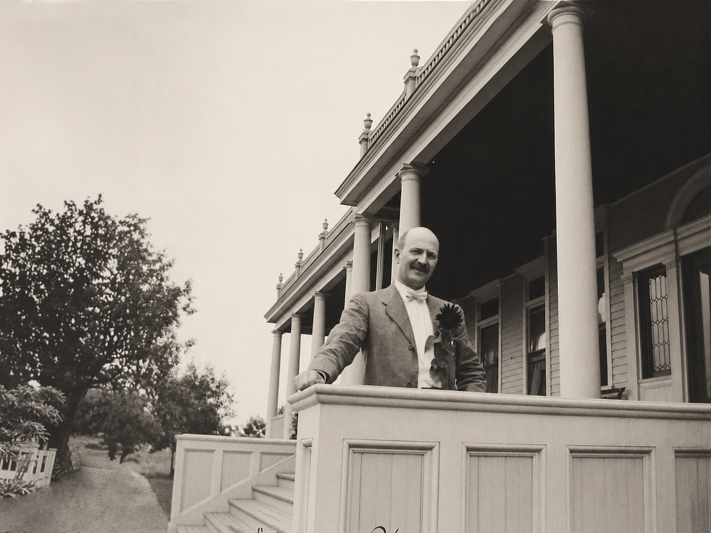 Dr. Drake on the steps of Idylease in 1909