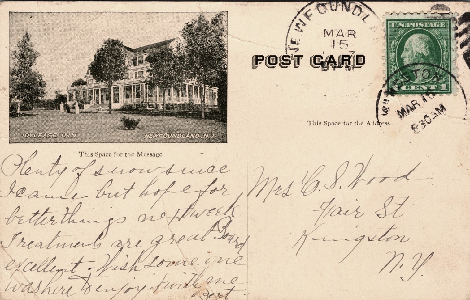 Reverse of a historic Idylease Inn postcard with handwritten message and postage