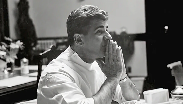 Dr. Arthur D. L. Zampella seated in the main dining room at Idylease
