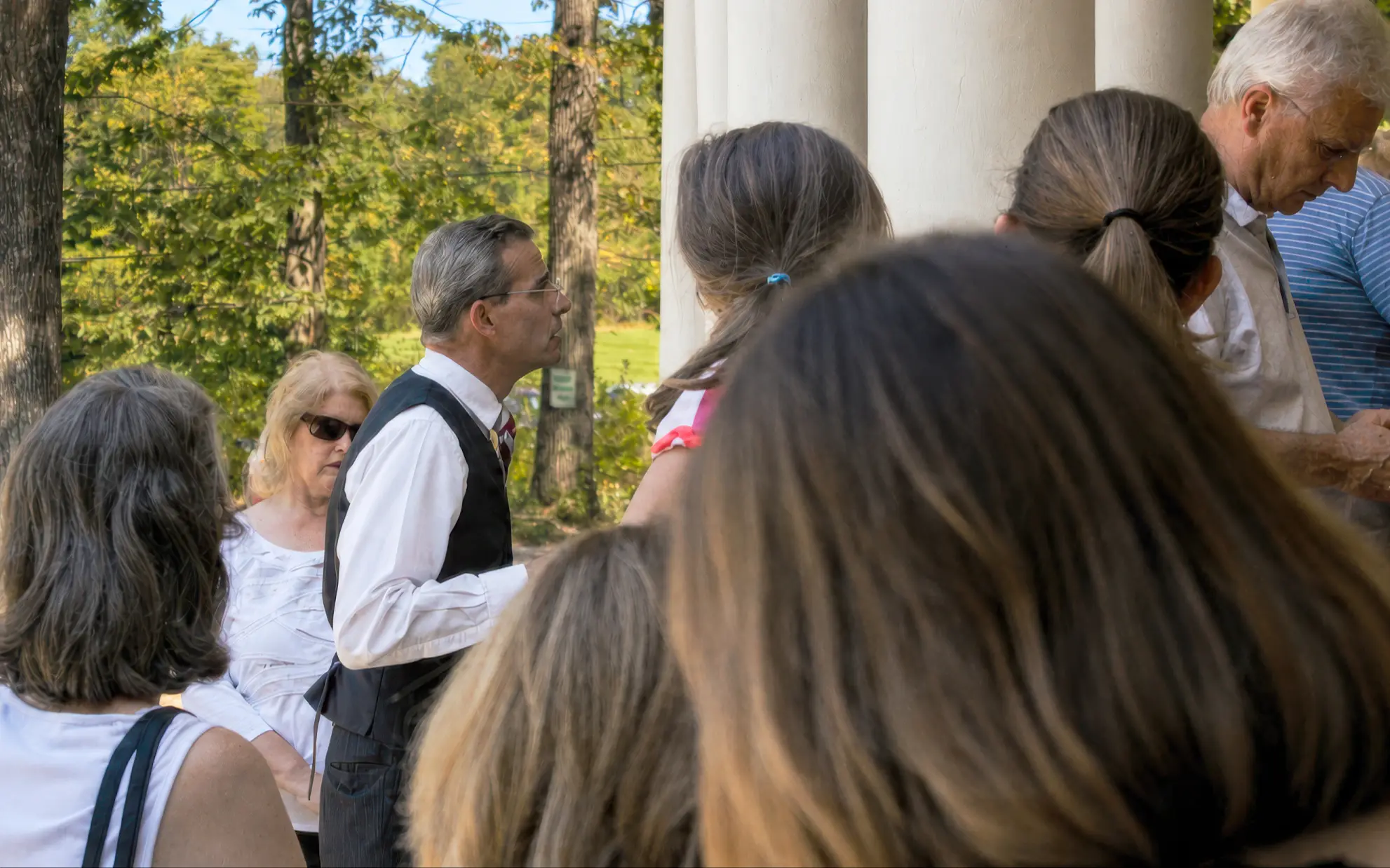 Richard Zampella leading a guided group tour on the front porch of Idylease in Newfoundland, New Jersey